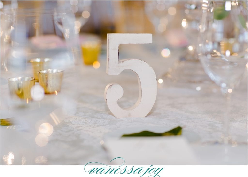 wood table numbers, mallard island wedding details