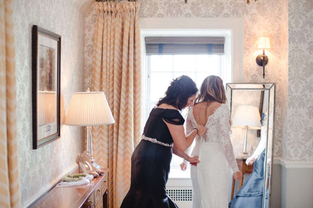 bridal getting ready photos, mother of the bride helping bride