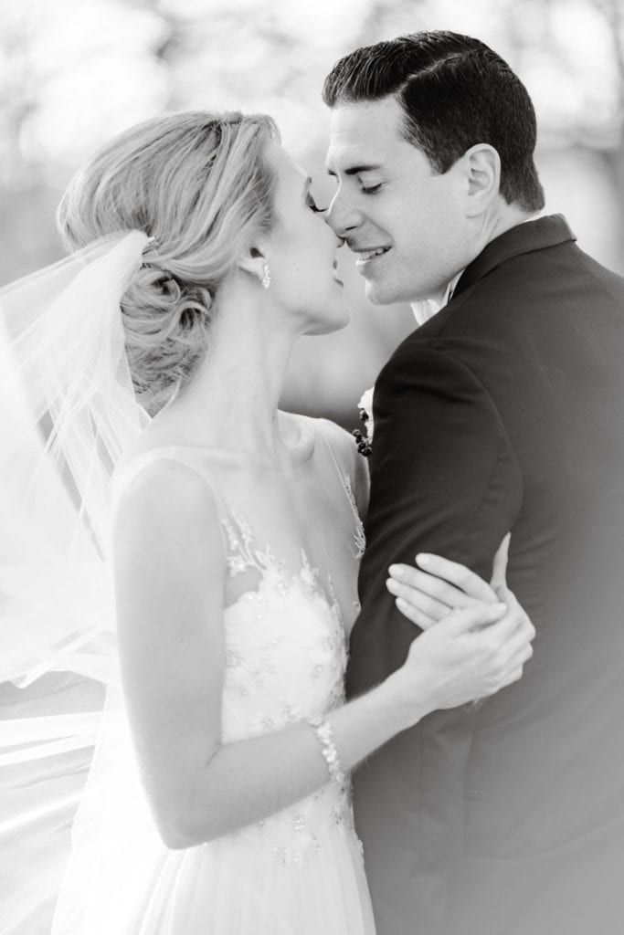 bride and groom embrace, black and white photography, nanina's in the park wedding