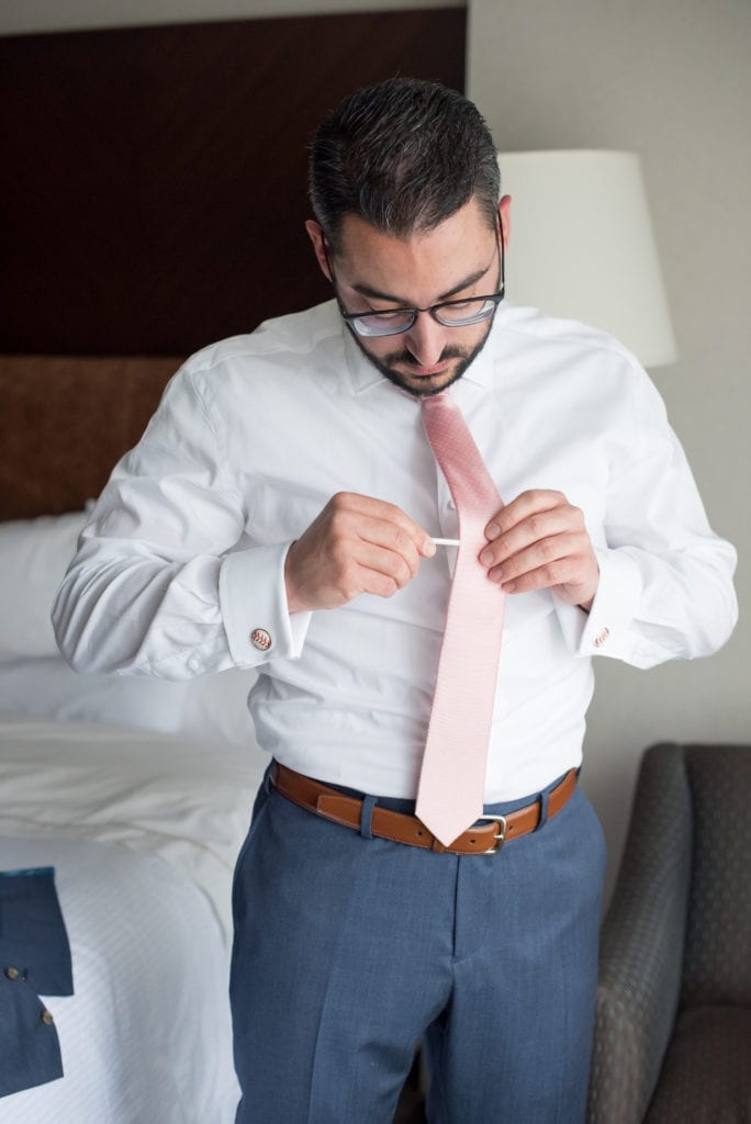 Groom’s Guide to Prep for The Wedding; groom getting ready