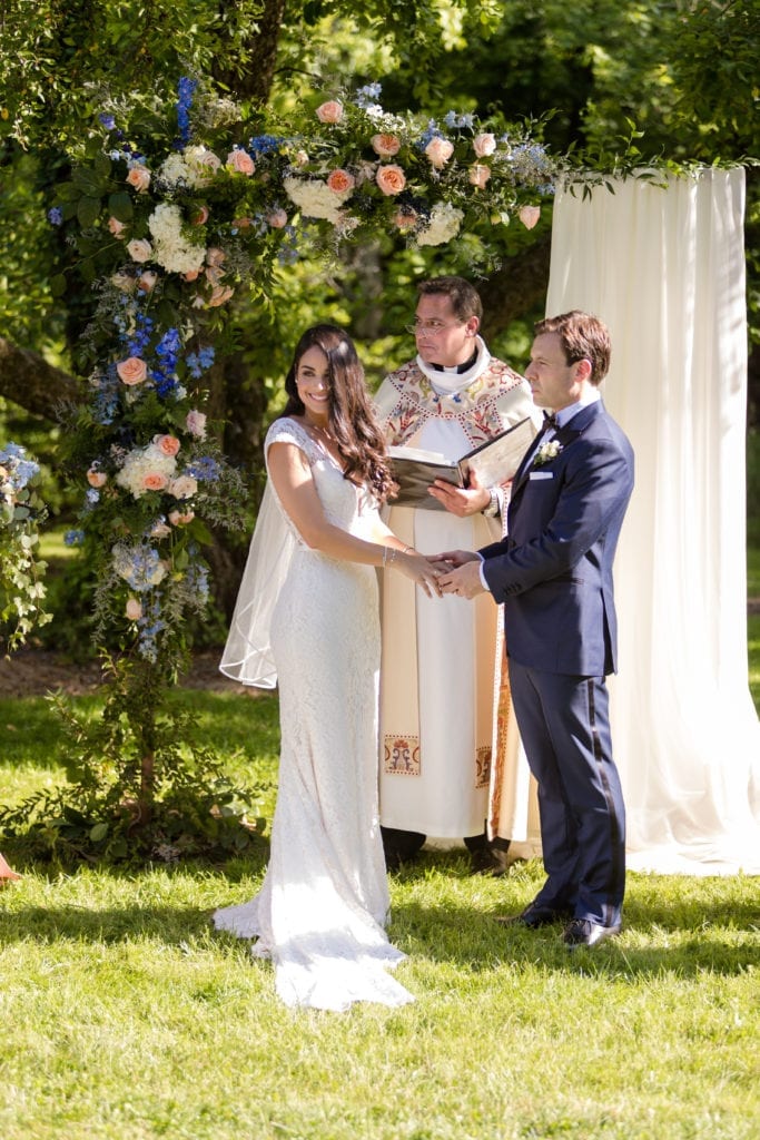 wedding ceremony, floral arch