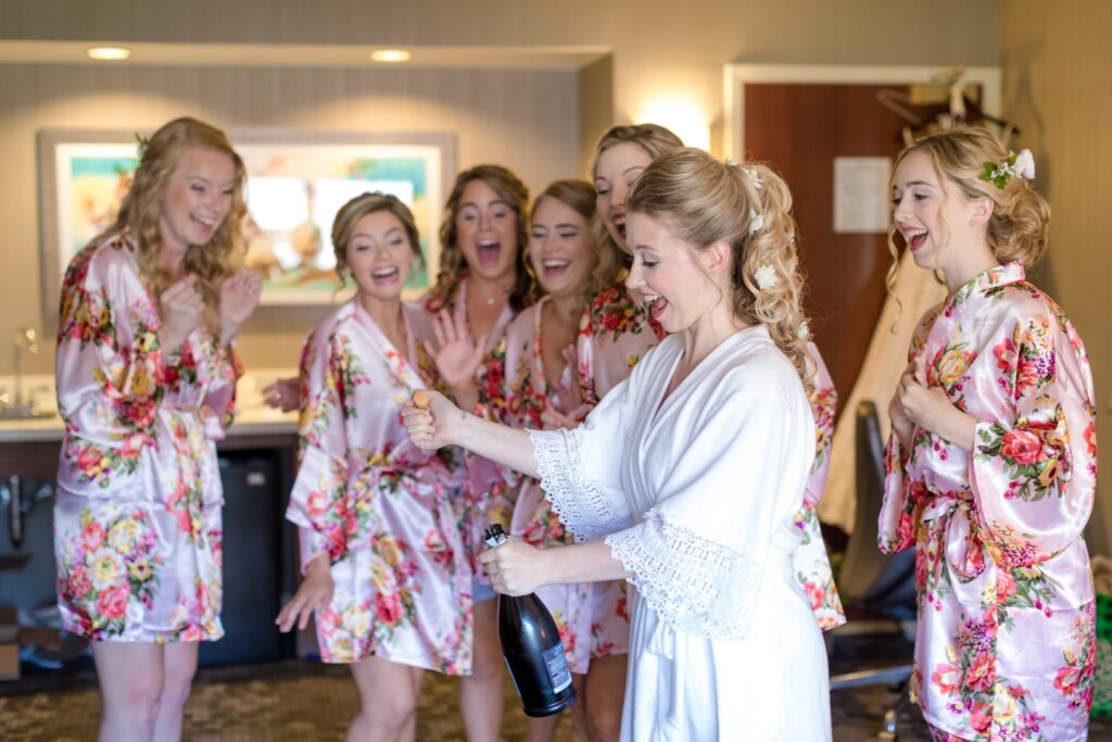 bridal party prep photography, bridal champagne