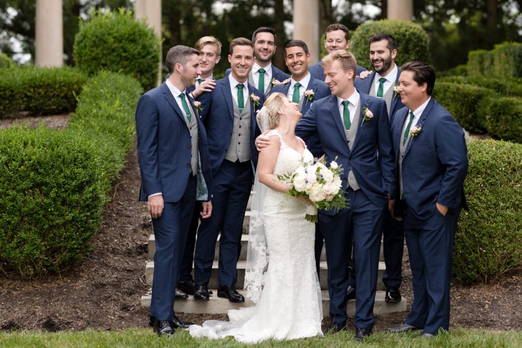 bride with groomsmen photography