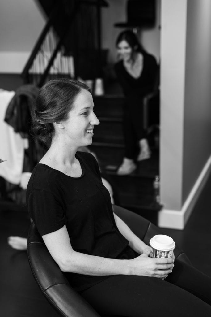 black and white photography of the bride getting ready