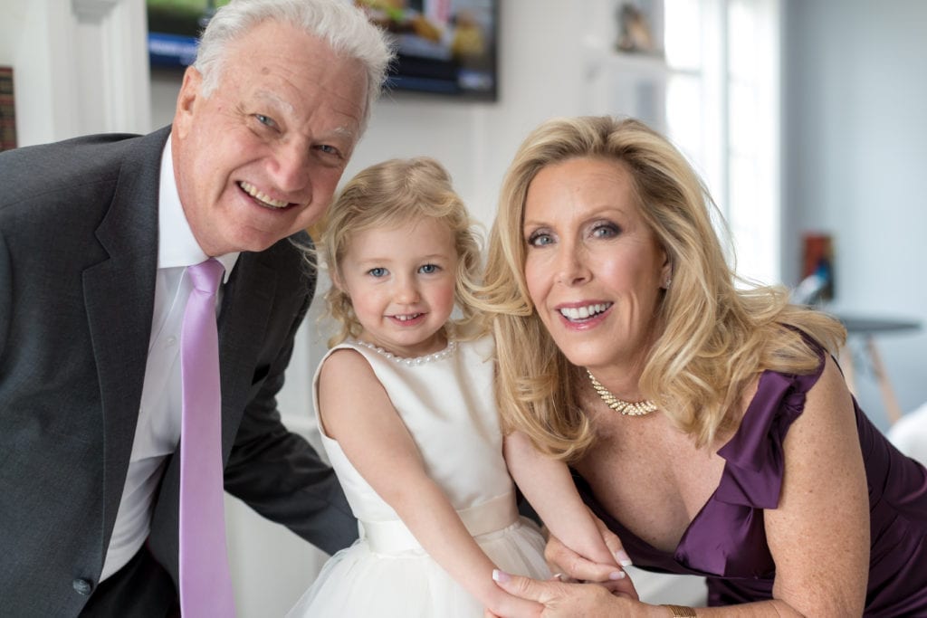 parents of the bride with flowergirl