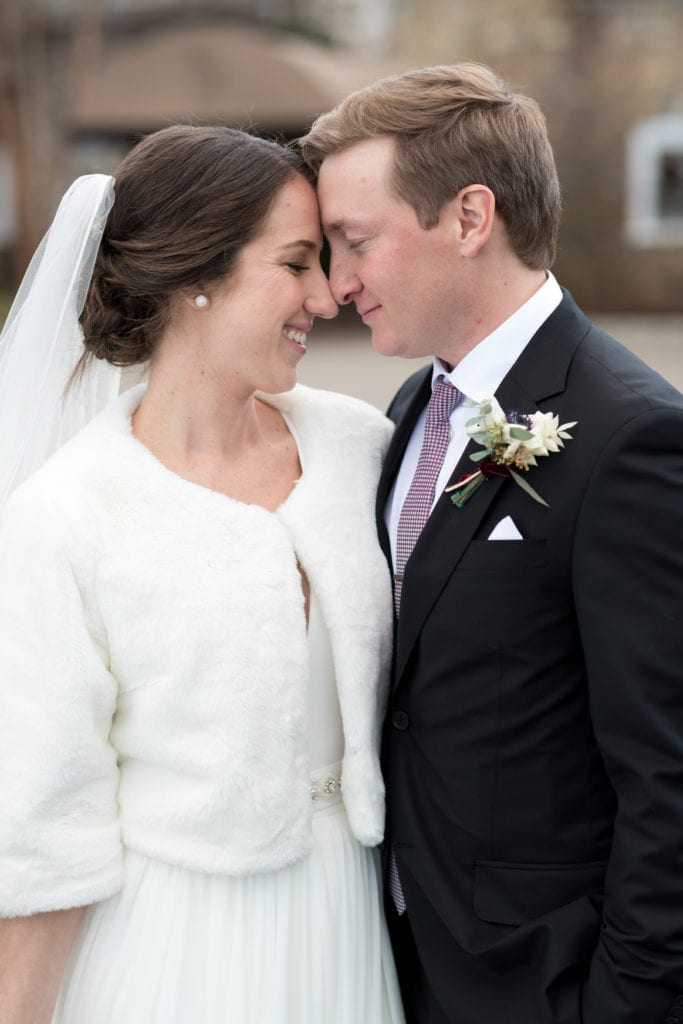 bride and grooms sweet embrace 