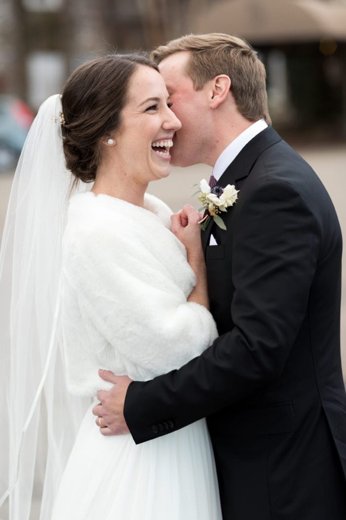 husband and wife sharing a kiss