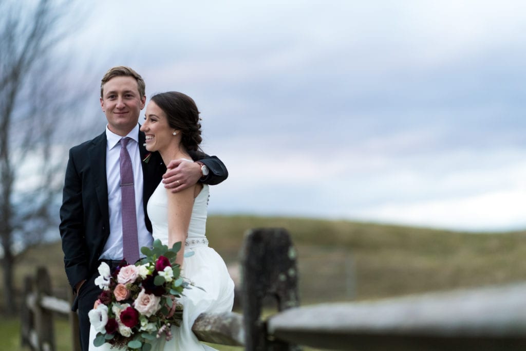 bride and groom posing