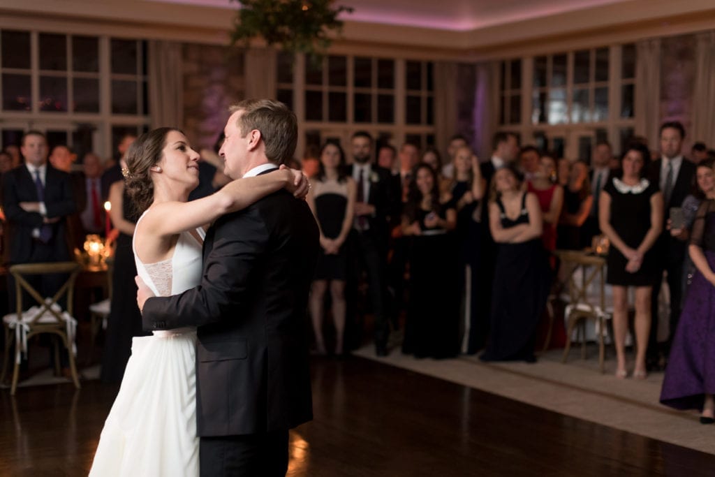 bride and groom enjoying their first dance