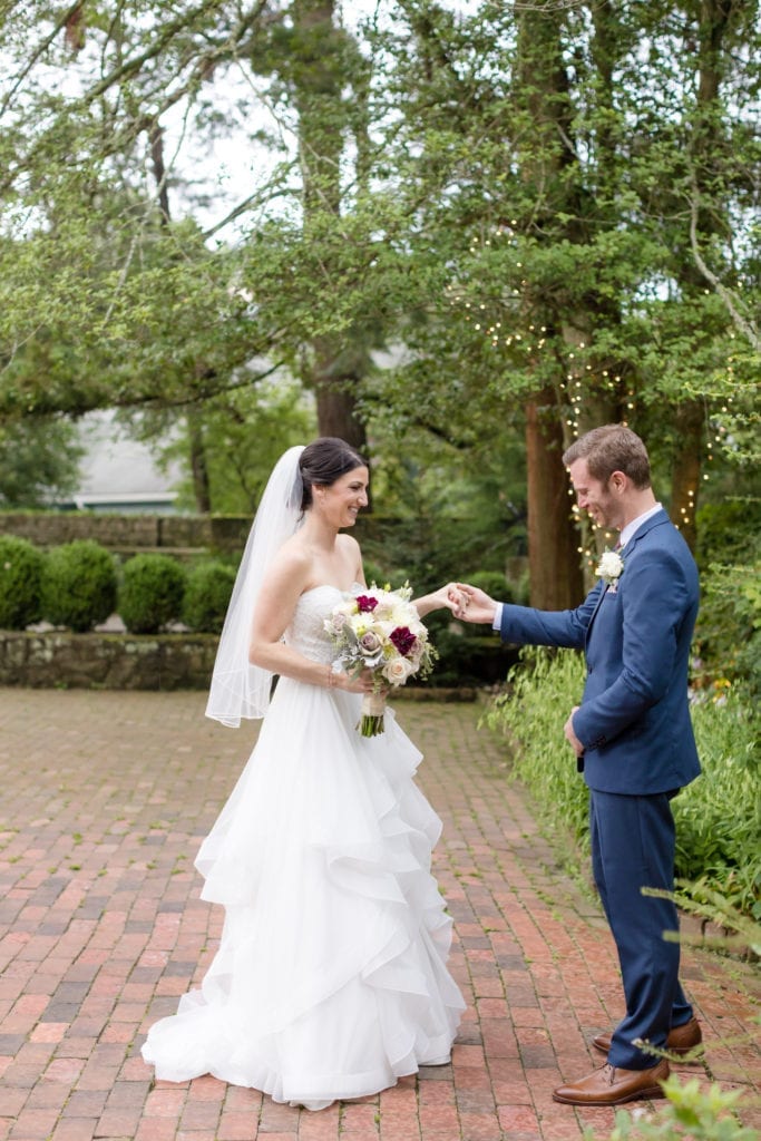 groom admiring his bride