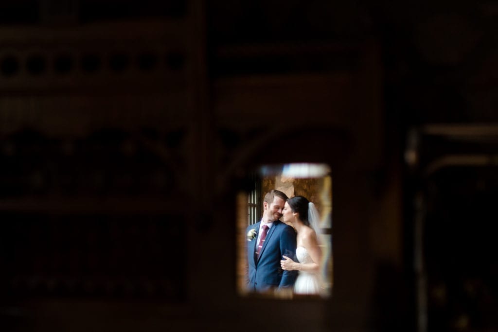 bride and groom and in a small window