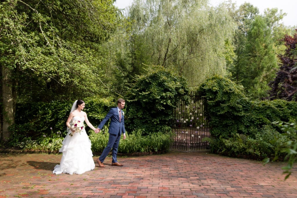 bride and groom outside of scenic hollyhedge estate