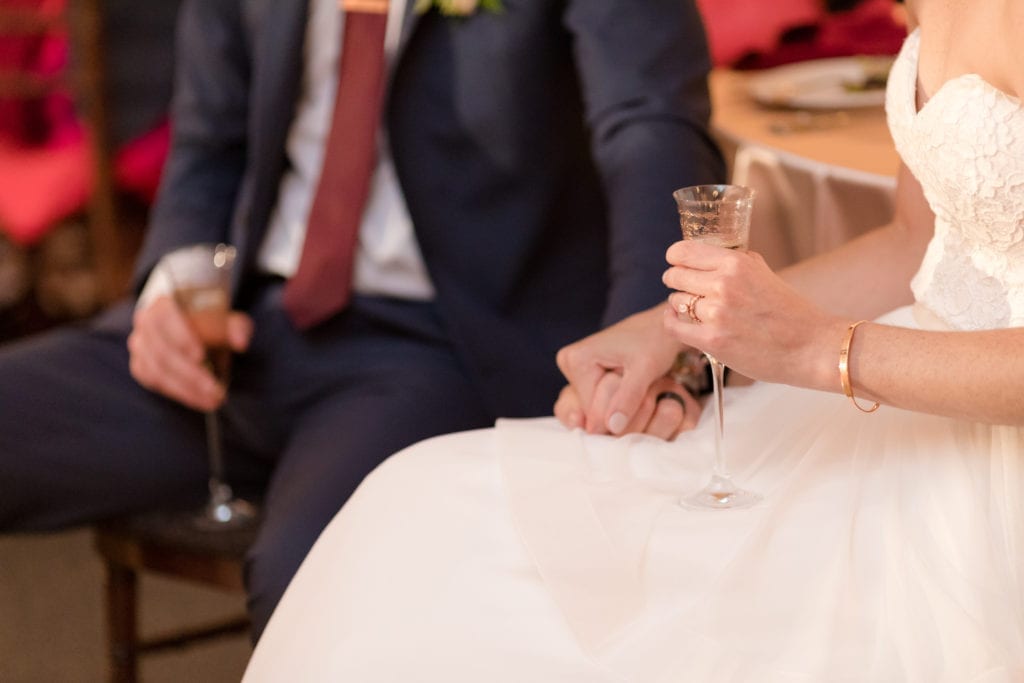 bride and groom with champagne