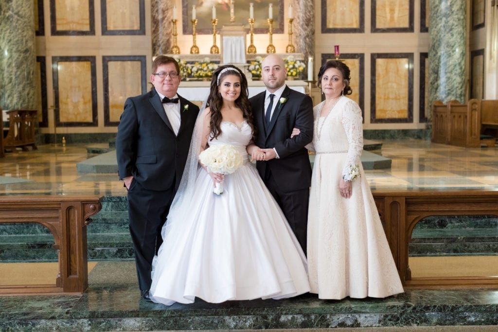 bride and groom with the bride's family