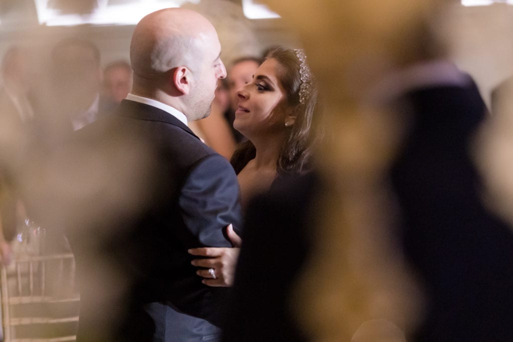 bride and groom sharing a few words during the wedding reception