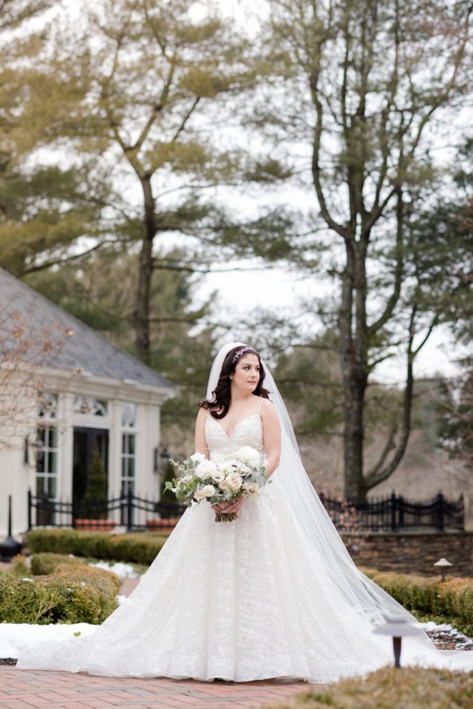 bride standing outside of ashford estate