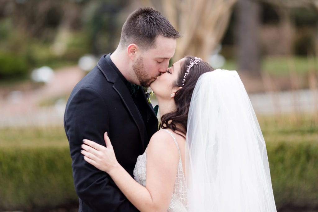 groom kissing his bride