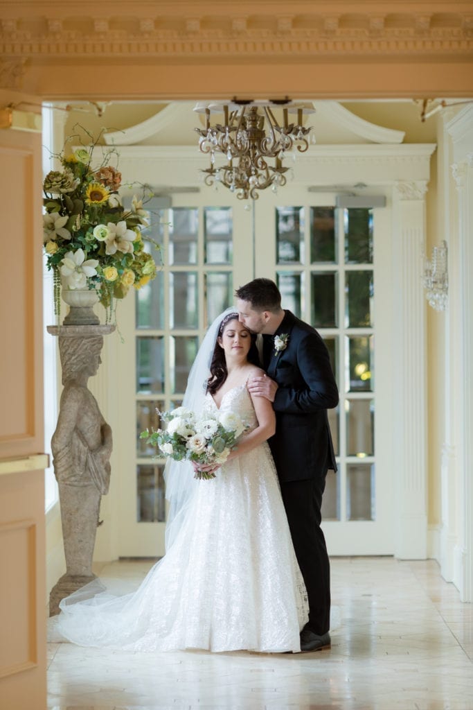 bride and groom sharing a kiss