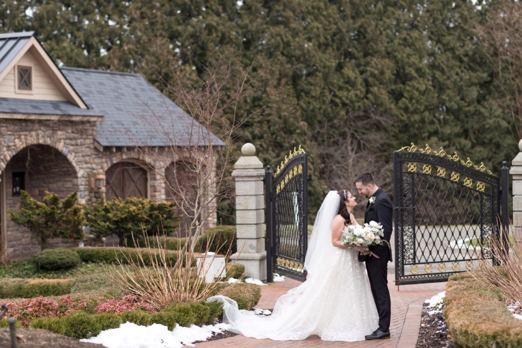 bride and groom outside of ashford estates