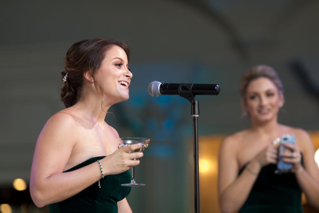 bridesmaid reading her speech