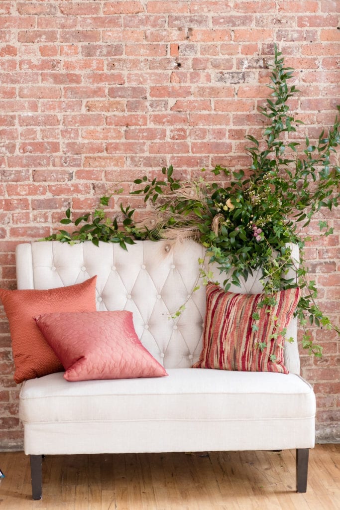 sitting area at wedding, exposed brick wedding decor ideas