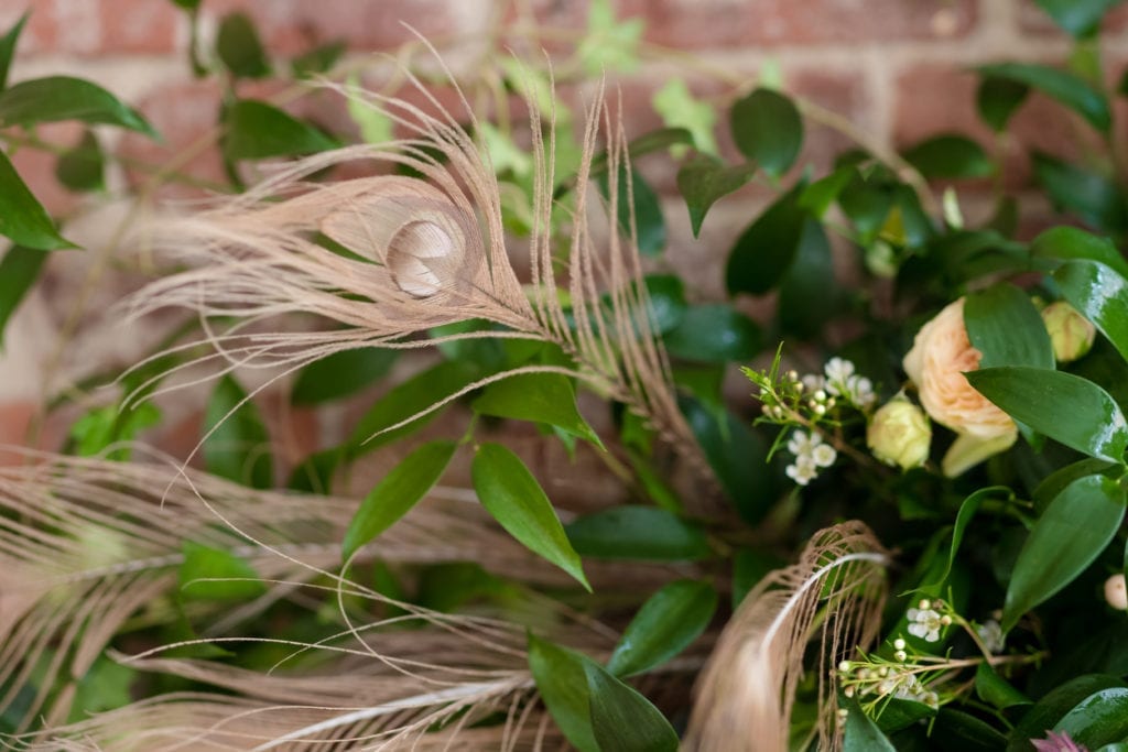 peacock feather florals for wedding, modern boho bride decor ideas