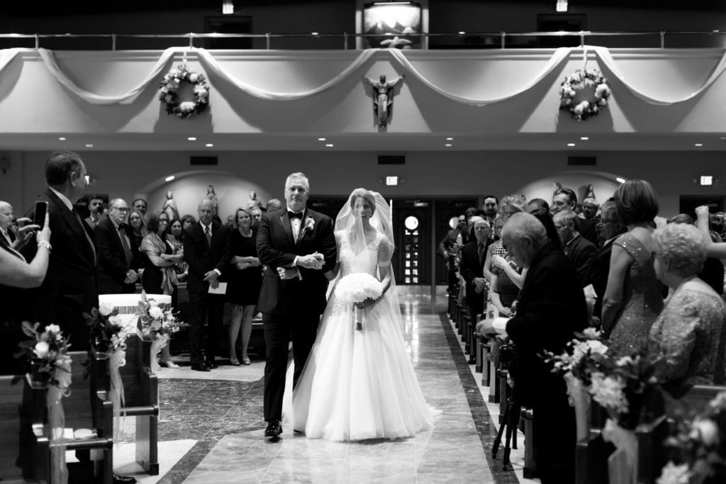 wedding procession, father of the bride walking bride down the aisle