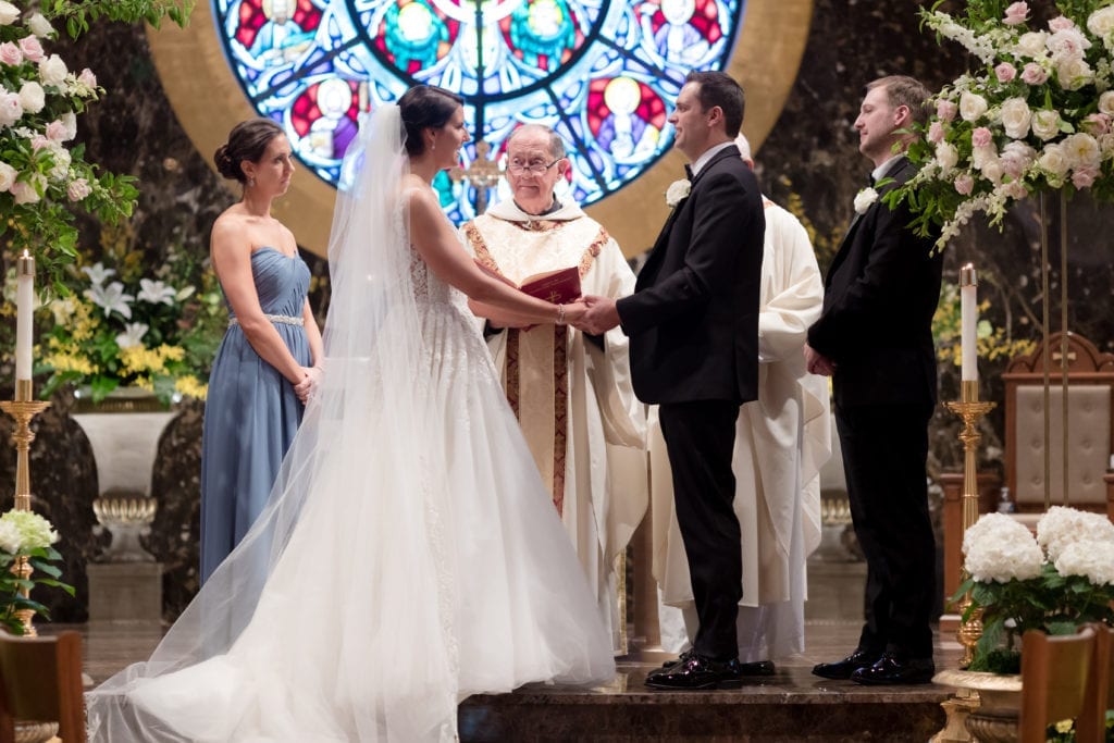 bride and groom exchanging vows, bride and grooms wedding ceremony