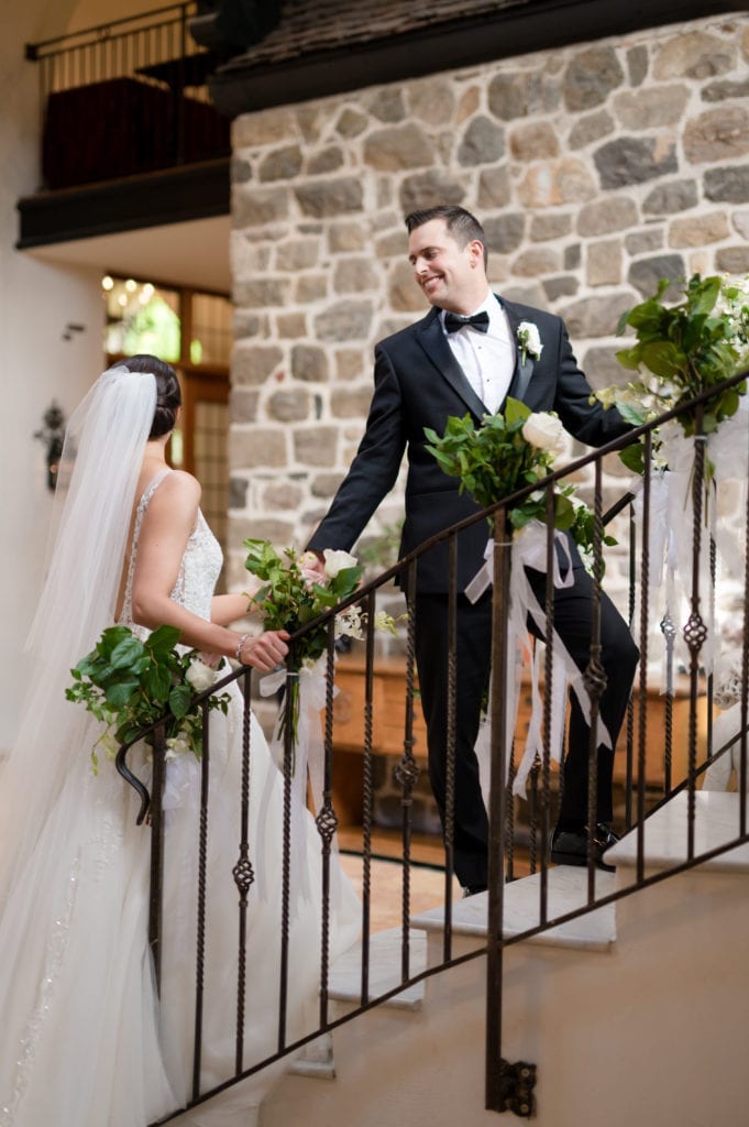 bride and groom sneaking away, Pleasantdale chateau 