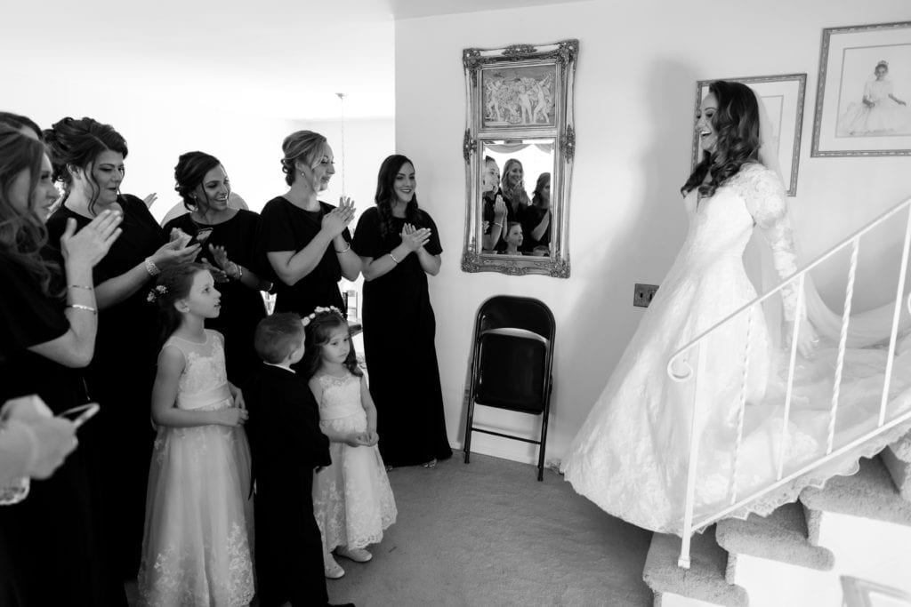 brides reveal to her bridesmaids