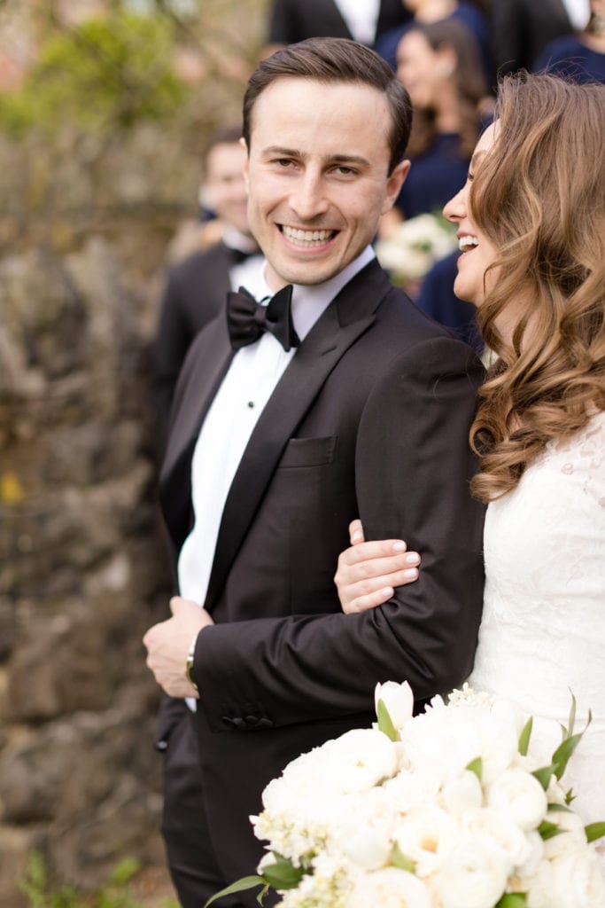 bride and groom sharing a laugh