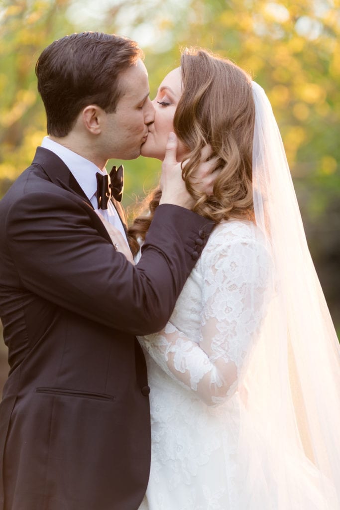 close up shot of bride and groom kissing