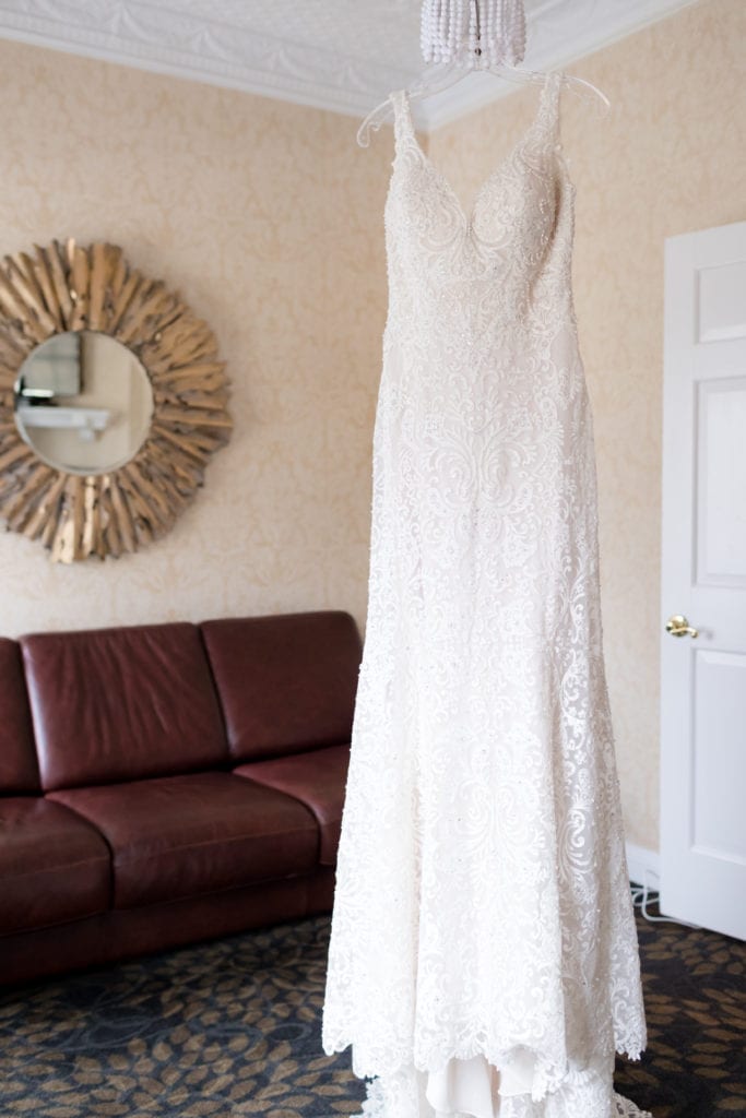 hanging photo of brides allure couture wedding gown