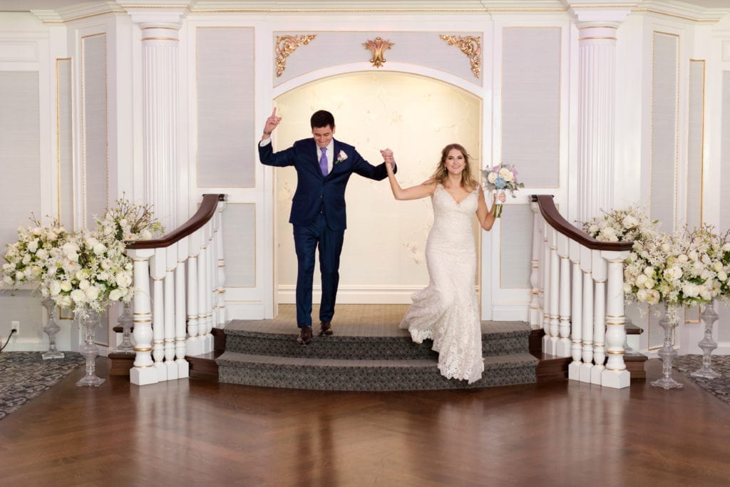 bride and groom entering wedding reception, sce event group