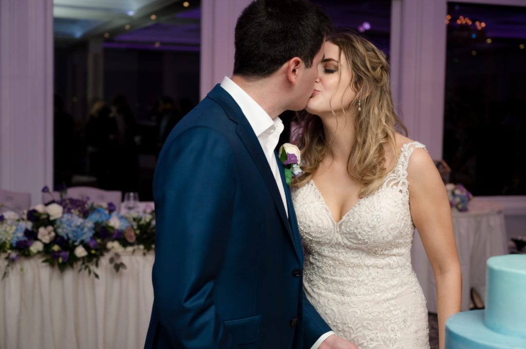 bride and groom embrace