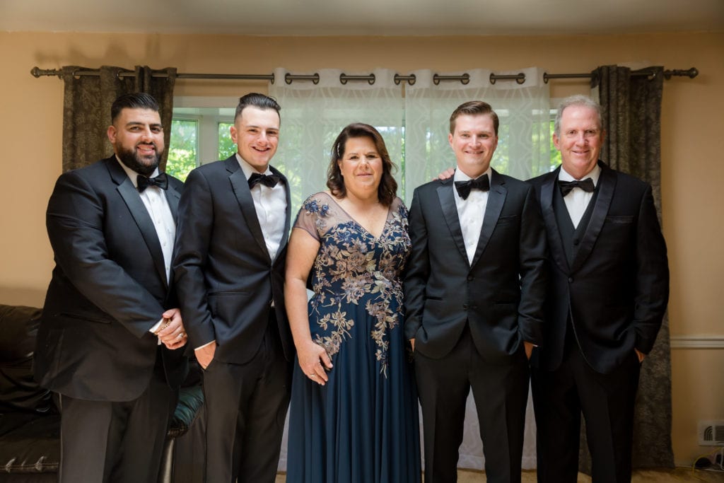 groom and his family, groom on his wedding day with family