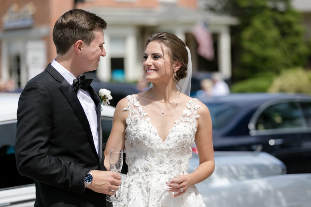 bride and groom having a champagne toast, bride and groom photography