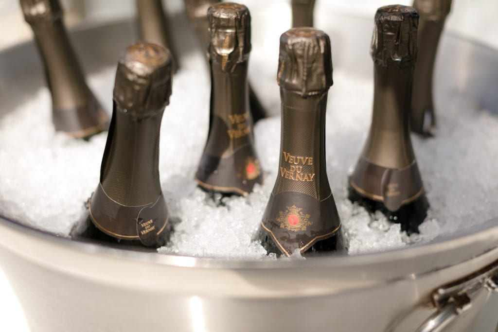 champagne ice bucket at wedding