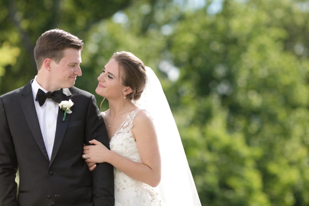 bride gazing into her grooms eyes, springtime wedding