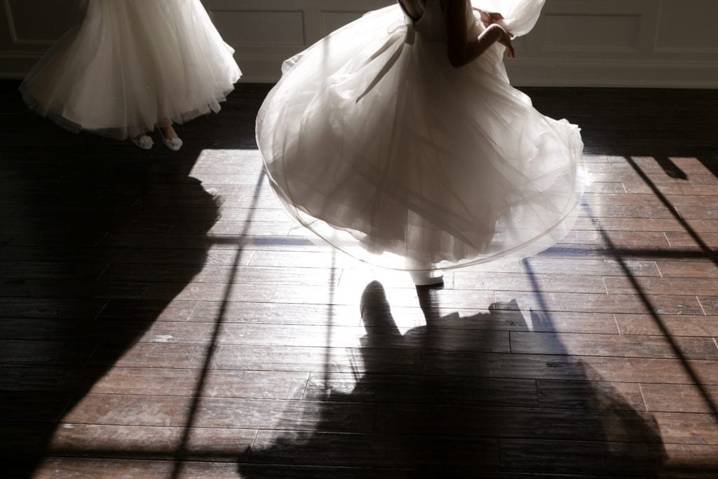 flower girls dancing, shadows of dancers