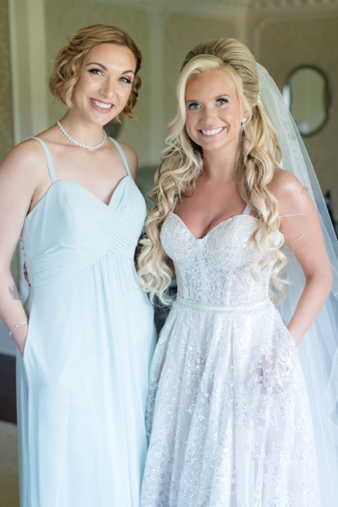 bride and her bridesmaid, sweetheart cut berta bridal