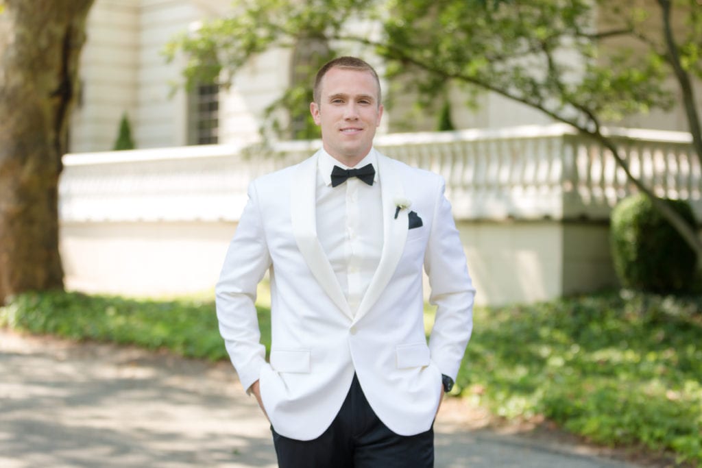 White and Black J Crew Wedding suit. groom on his wedding day