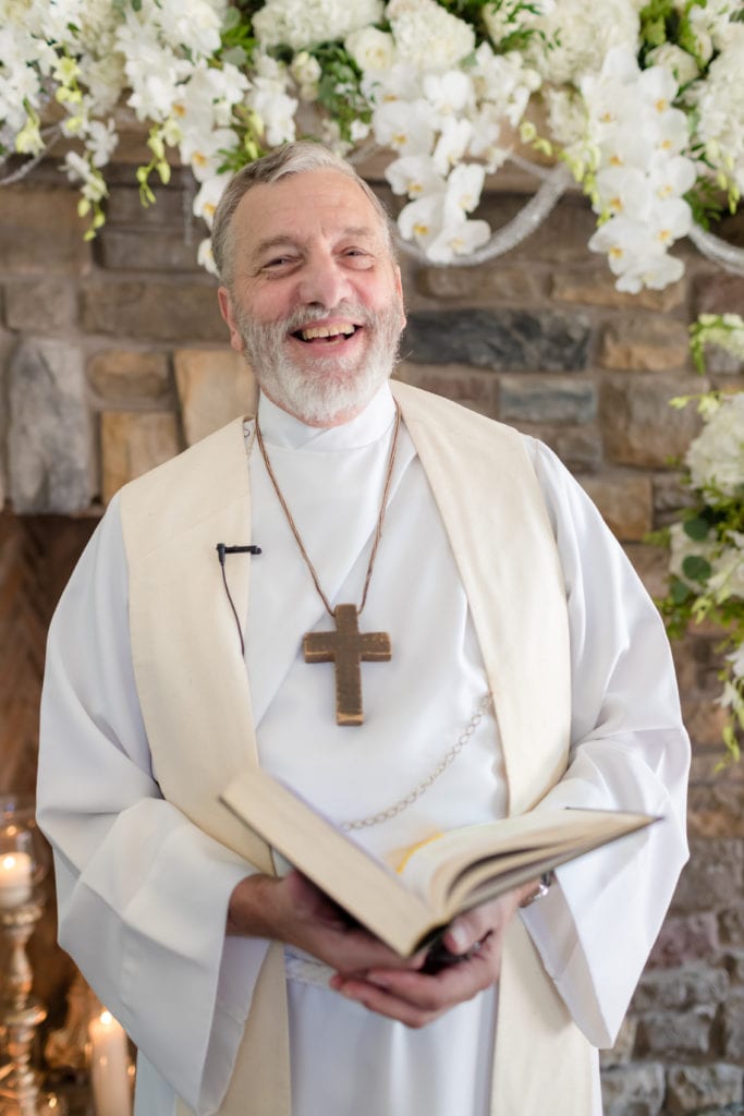 Priest at the alter