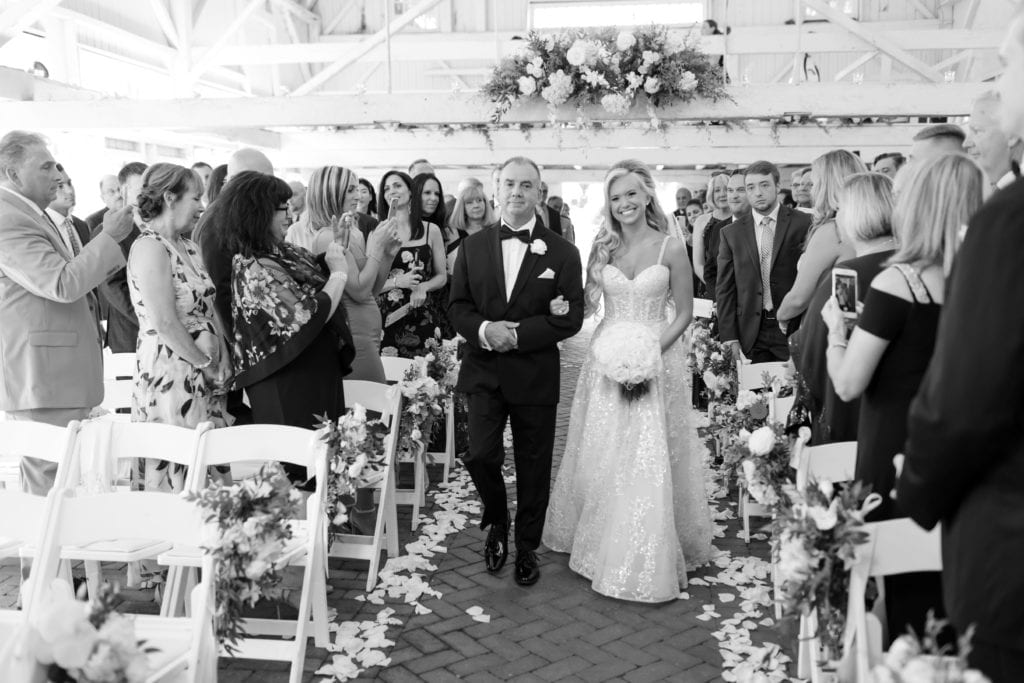 bridal recession, bride and her father walking her down aisle