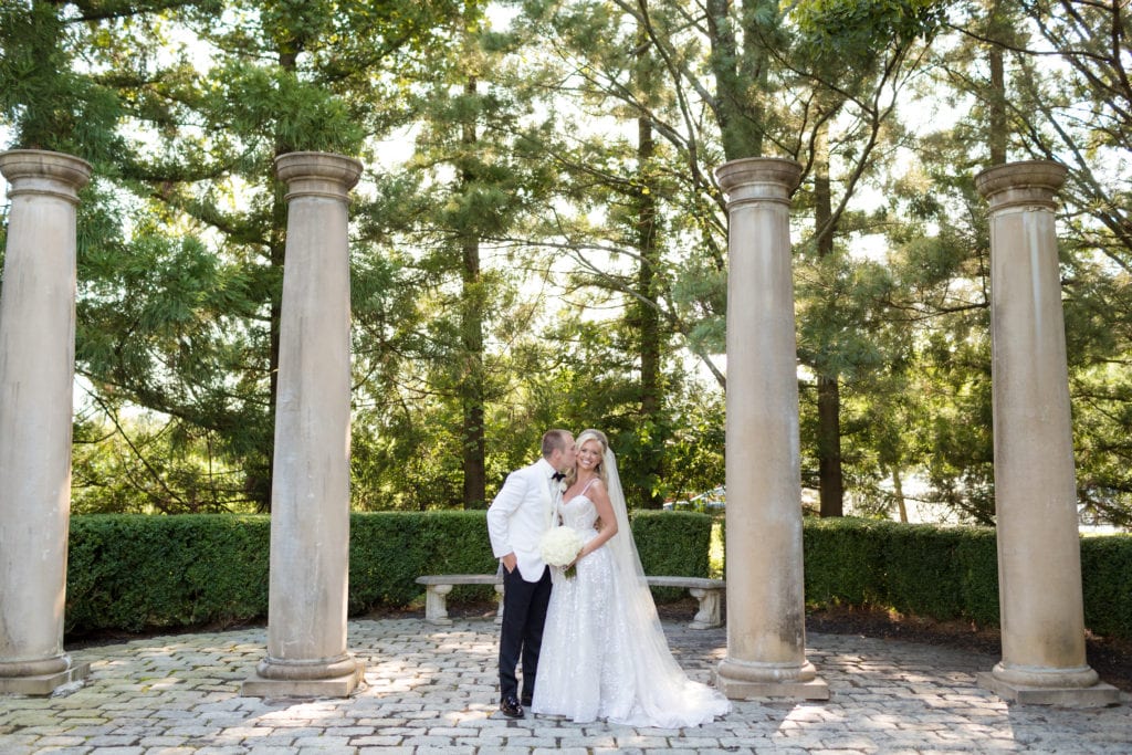 groom kissing his bride