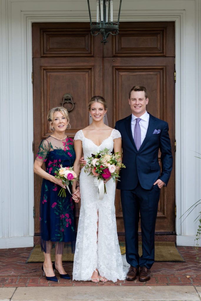 bride and groom with mother of the groom