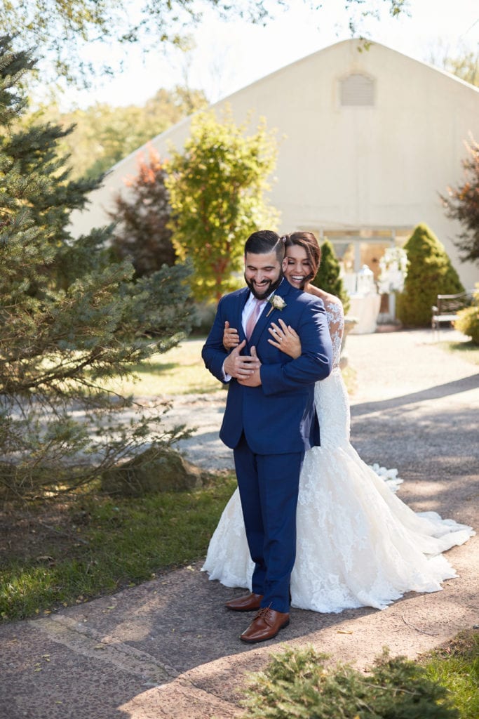 bride teasing groom before first look