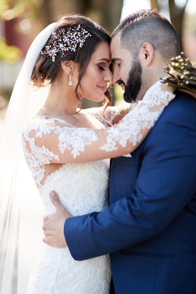 bride and groom embracing