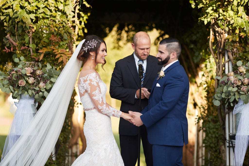 Brandywine Manor House wedding ceremony, bride and groom at alter 