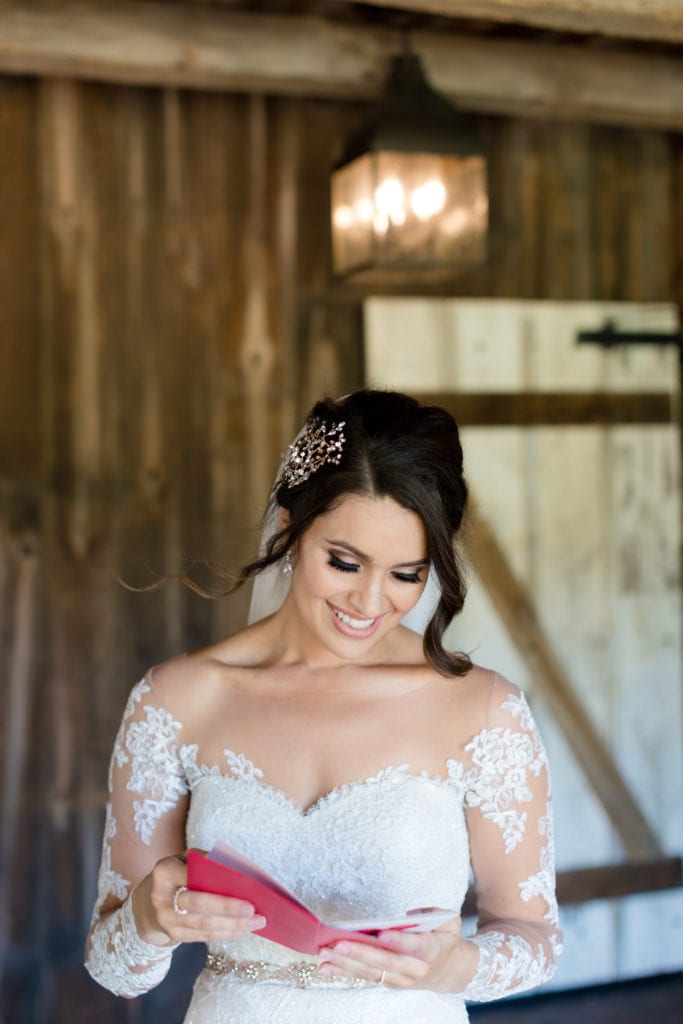 bride reading letter from groom, bride on her wedding day